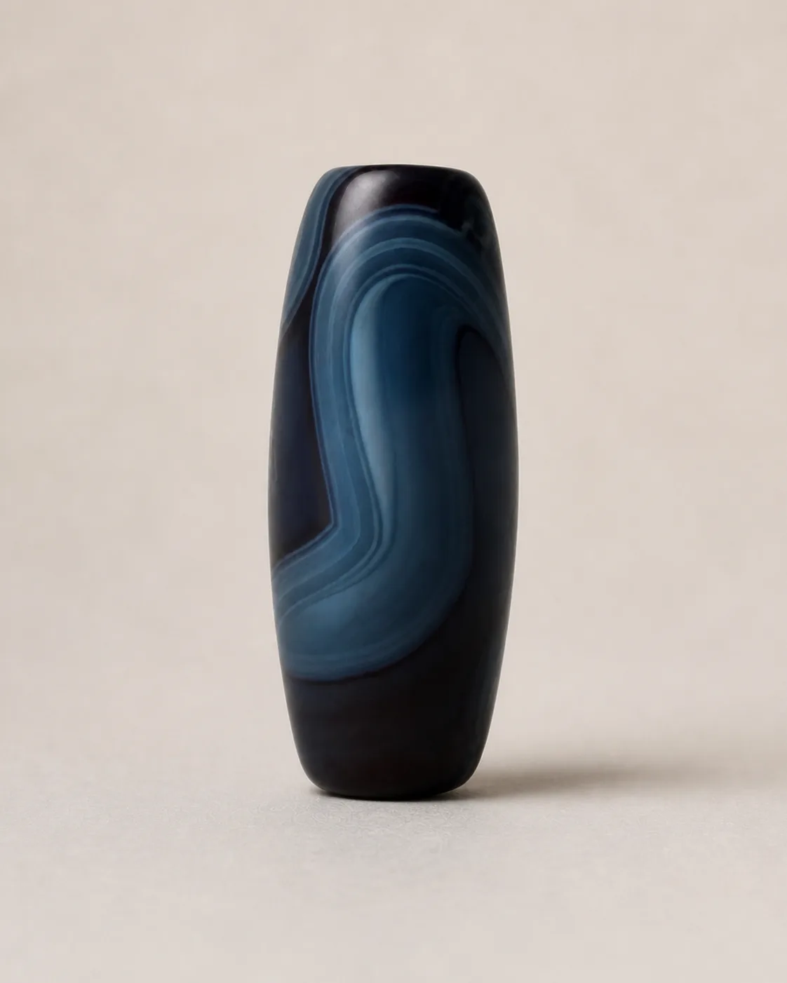 Banded Agate Dzi Bead with broad blue-black sweeping bands — approx. 32 × 13.8 mm | Front