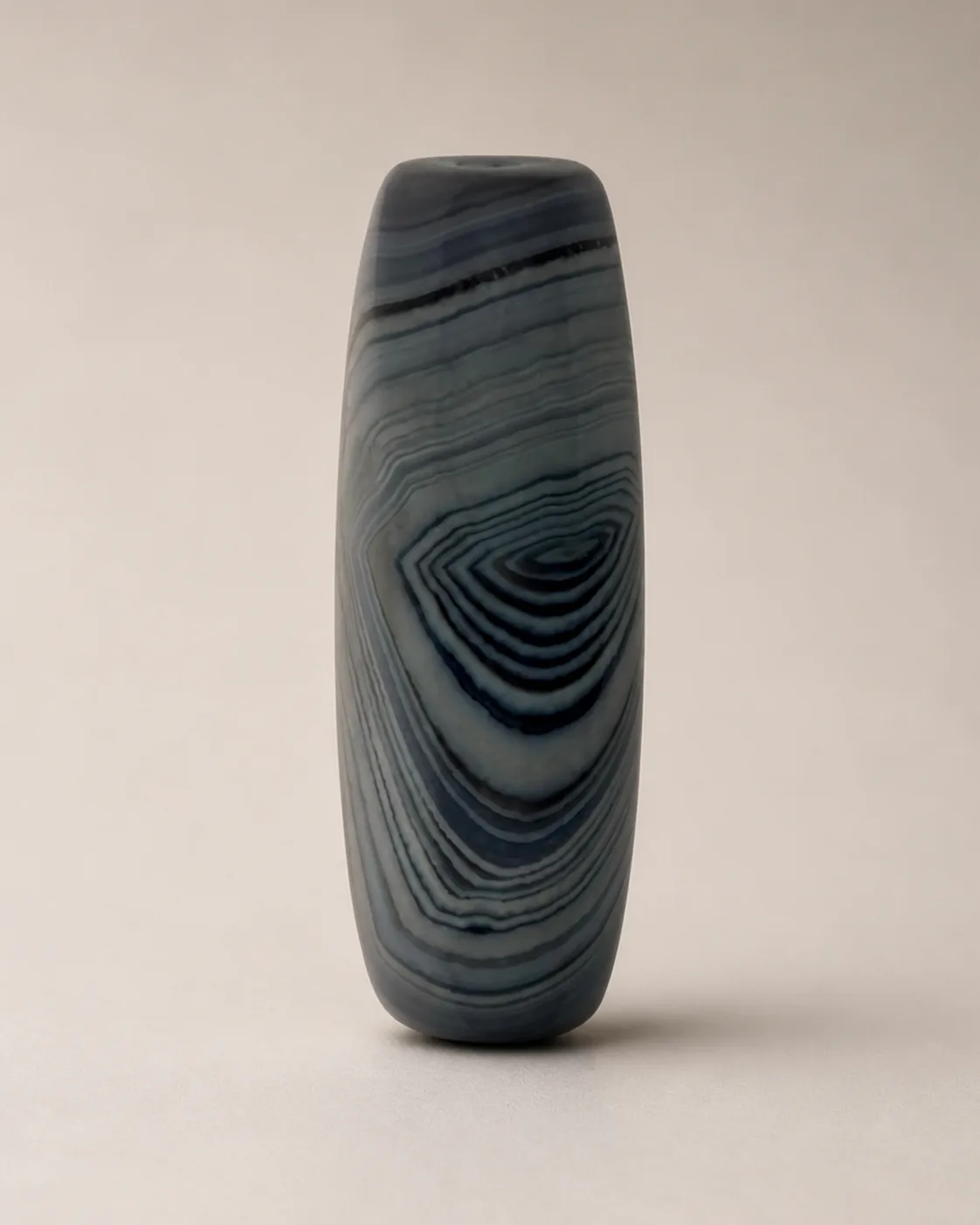Banded Agate Dzi Bead with grey nested diamond-and-oval layers — approx. 41.6 × 14.8 mm | Front