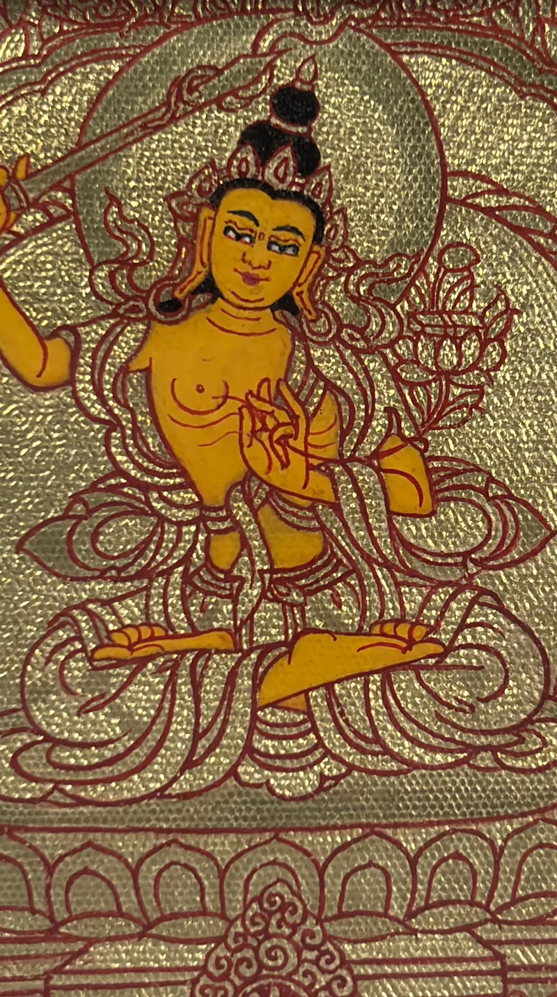 Manjushri miniature detail with red contours on a gold ground