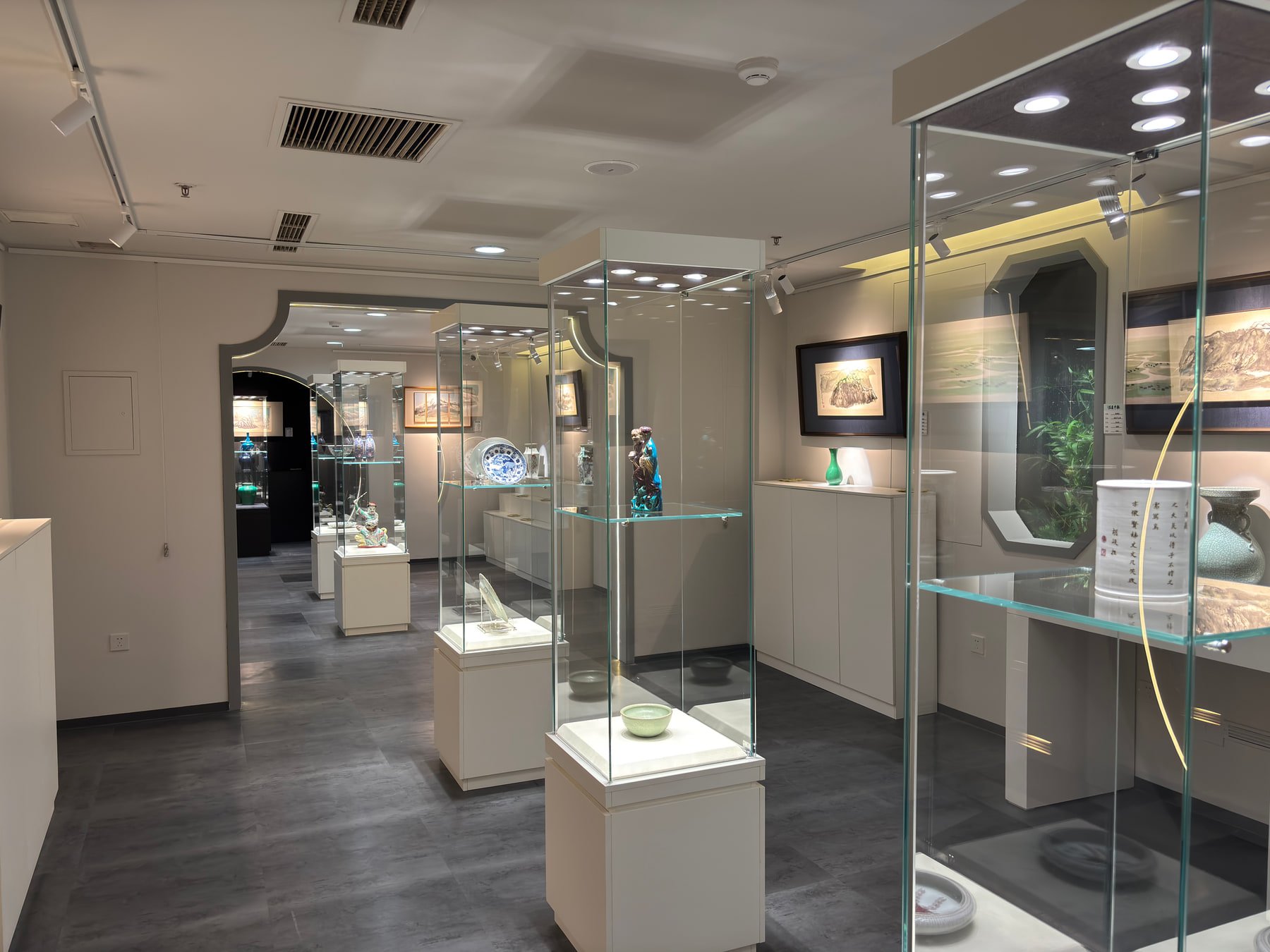 A sequence of display cases extending through the interior