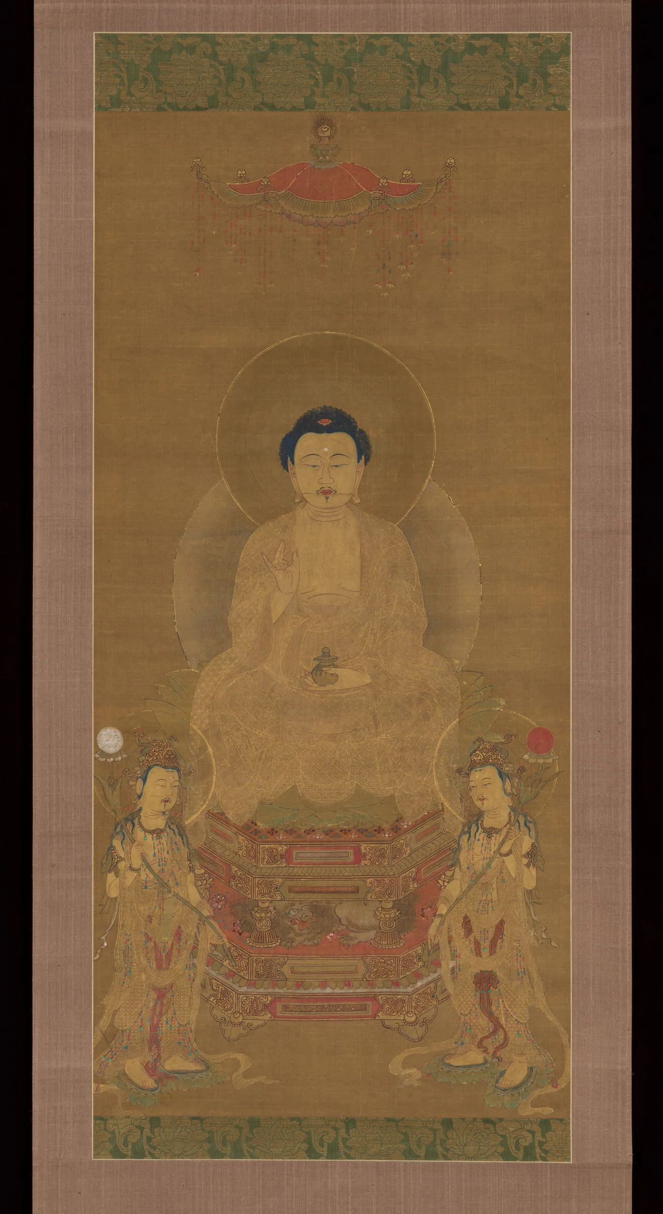Triad of the Medicine Master Buddha Yakushi in a Japanese hanging scroll from the seventeenth or eighteenth century