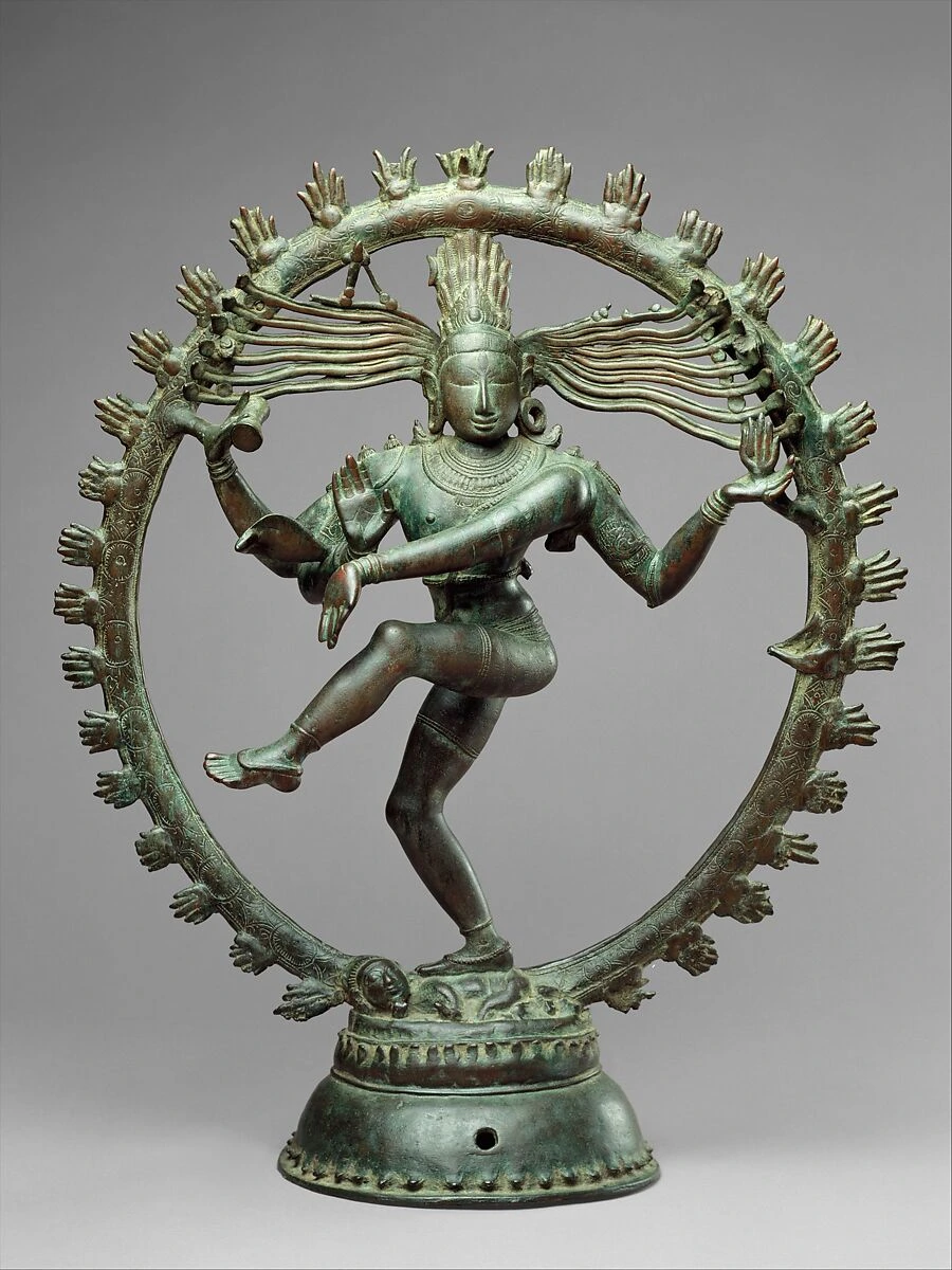 Shiva as Lord of Dance holding a damaru in his upper right hand