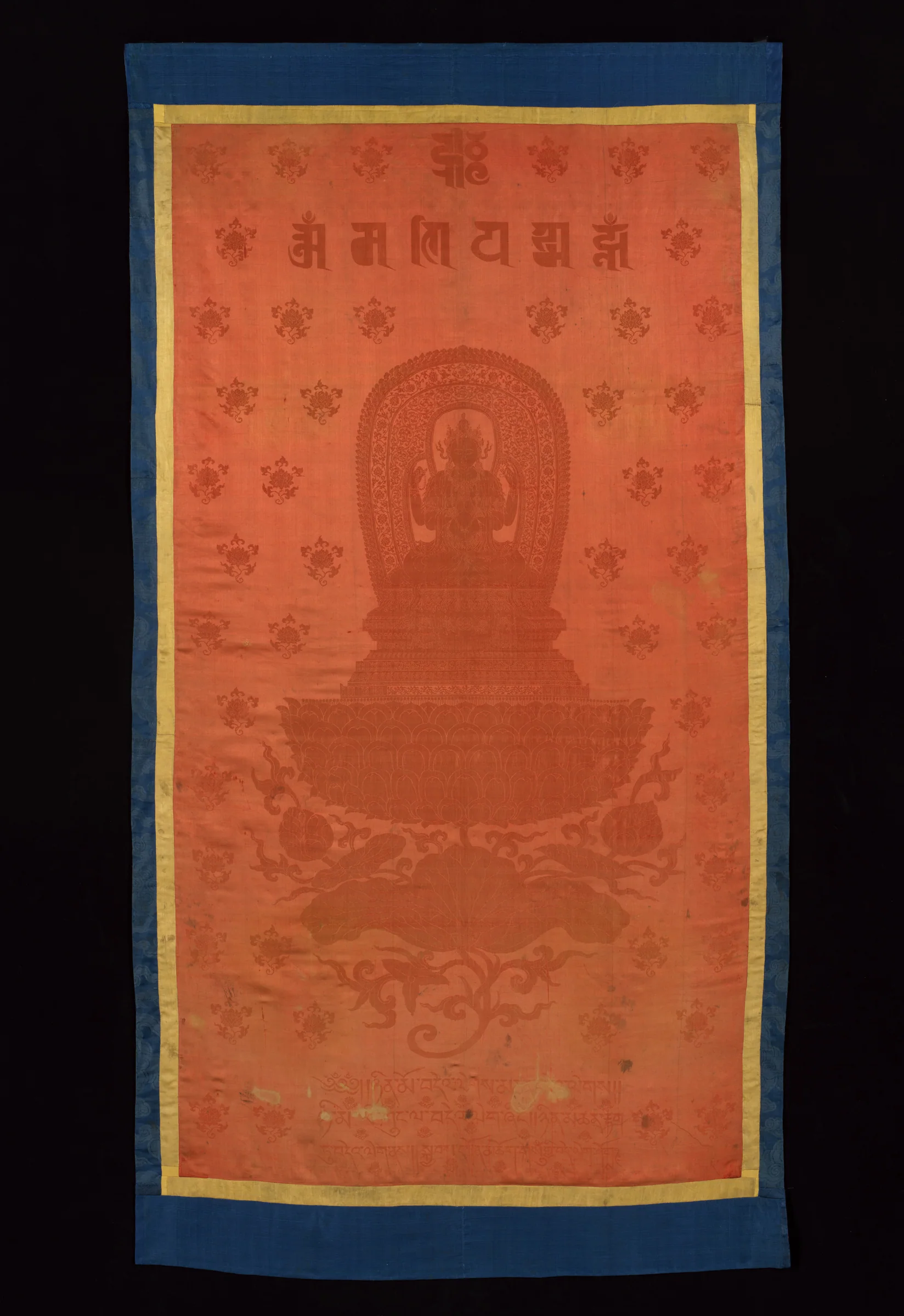 Avalokiteshvara as Shadakshari Lokeshvara, a silk twill damask temple hanging