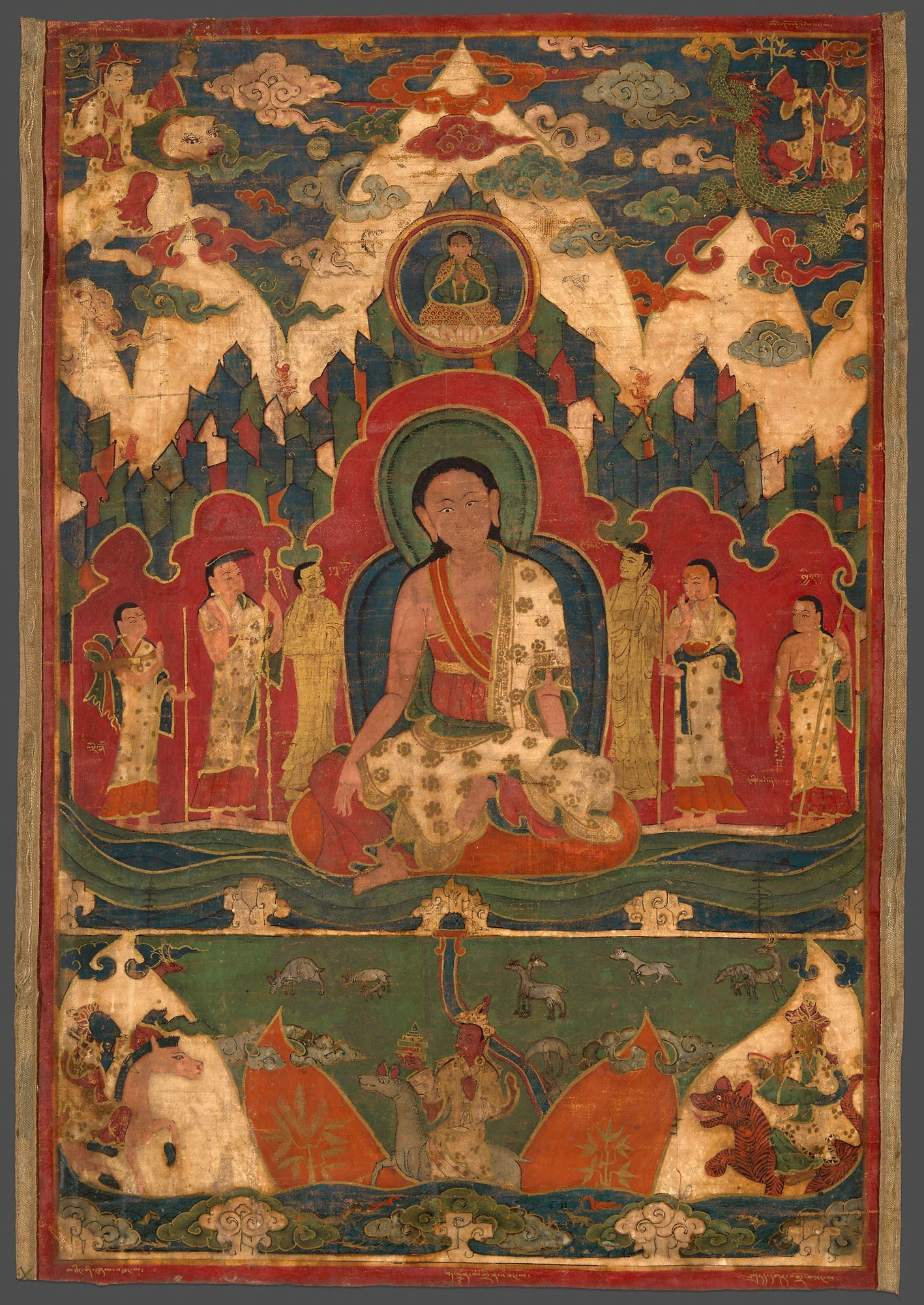 Milarepa seated before Mount Kailash, surrounded by figures and a mountain landscape in a painted banner.