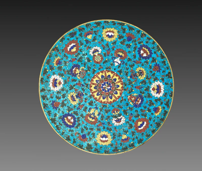 Complete turquoise cloisonné mandala base with flowers and eight Buddhist auspicious symbols arranged around a central rosette.