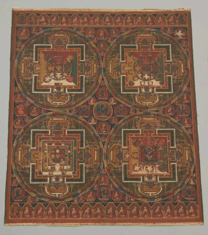Four circular Guhyasamaja mandalas with square palaces, gates and small figures arranged on one painted cloth.