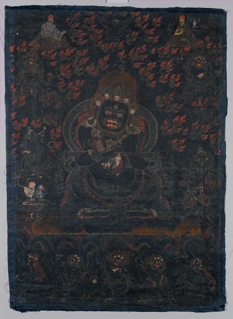 Dark-ground Mahakala thangka with a skull cup and curved knife held before the central protector.