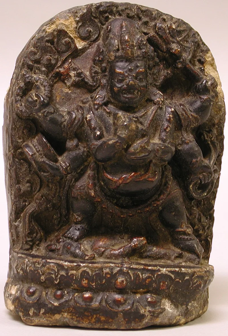Black-painted clay figure of Six-Armed Mahakala