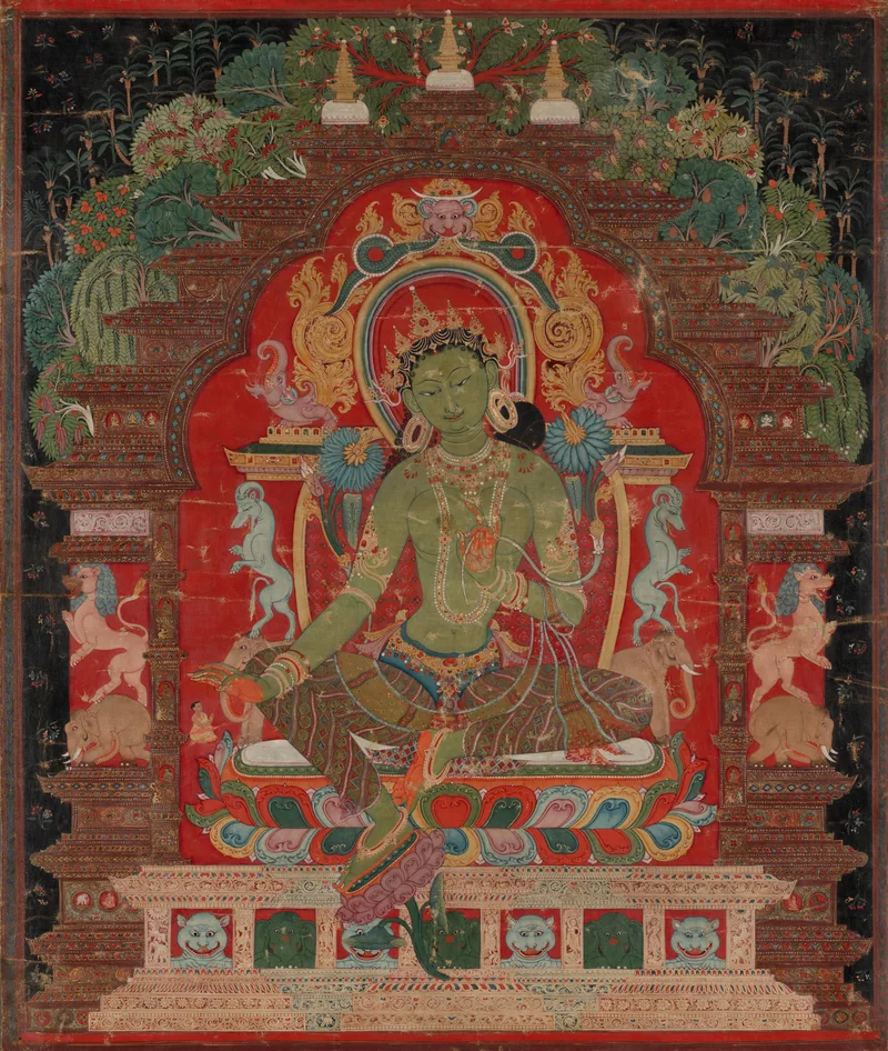 Green Tara seated in an ornate setting, with a small monastic patron beneath her right hand