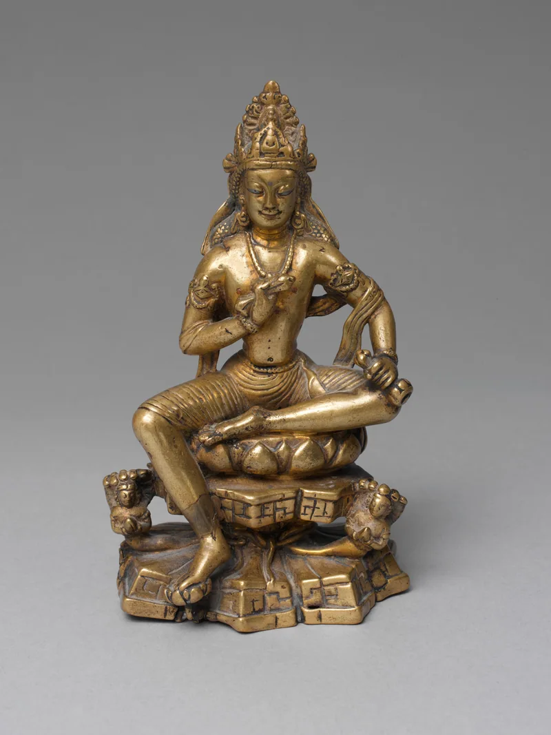 Seated Vajrasattva with a pendant leg and naga figures below