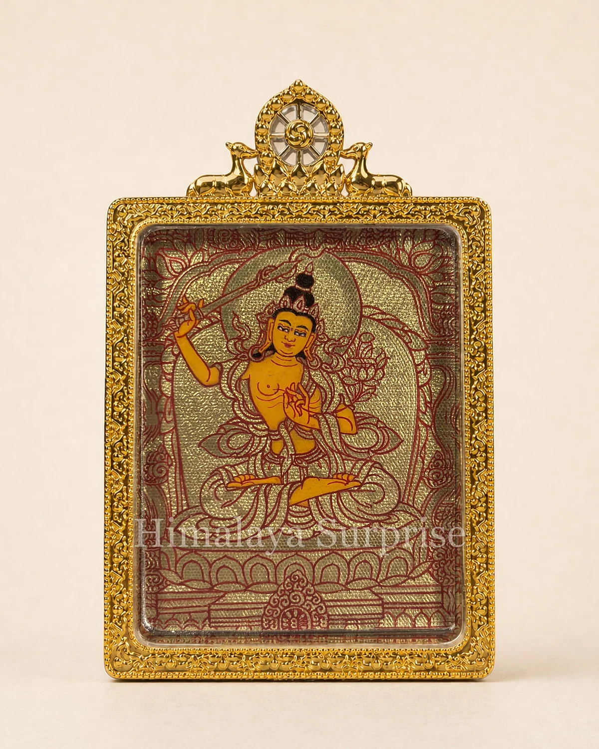 Gold-ground Manjushri miniature in a gold-coloured gau box, with its complete front housing visible.